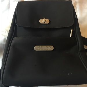 Black fabric knapsack bag